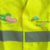 Picture of safety vest with Eves Trust and Ninehundred Communications Logos